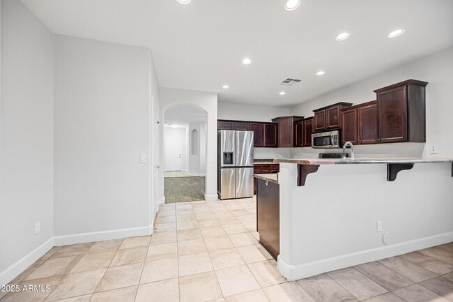 Building Photo - 10805 W Woodland Ave