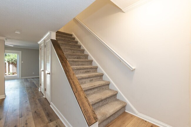 Building Photo - Fully Renovated 2BR Townhome-Style Condo – Available Now!
