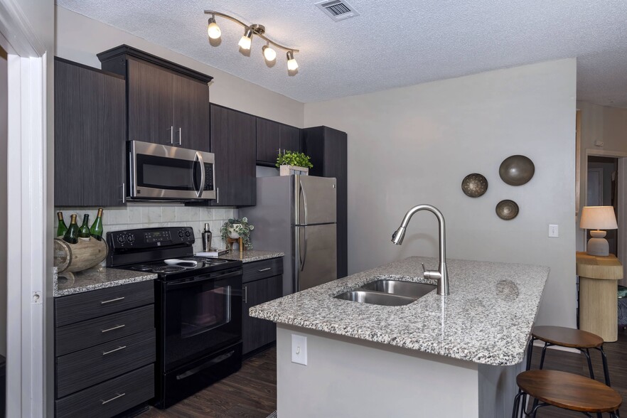 Building Photo - Seasons at Umstead Apartment Homes