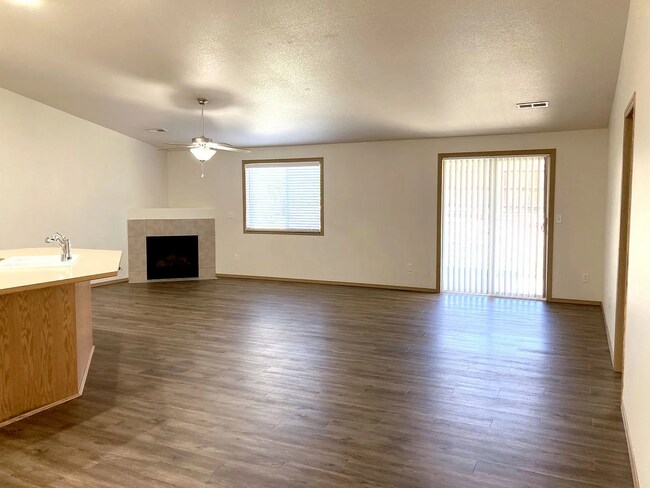 Building Photo - this ranch-style home features 4 bedrooms and 2 bathrooms.