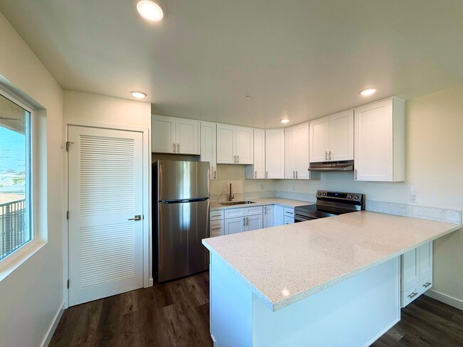 Building Photo - Welcome to Your Bright and Spacious Upstai...