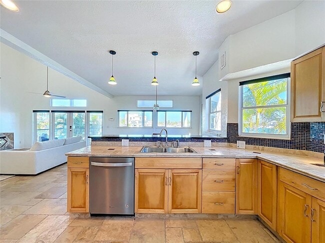 Building Photo - 8485 Blind Pass Dr