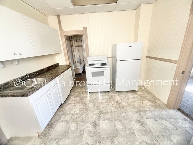 Building Photo - Quaint 2-bedroom cottage located in uptown...
