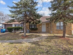 Building Photo - "Cozy 2-Bedroom, 1 bath Retreat with Fireplace Charm!"  One car garage, section 8 ok.