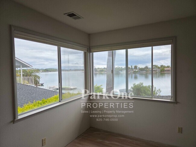 Building Photo - Stunning Waterfront Home with Private Boat Dock in Bel Marin Keys