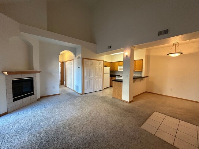 Building Photo - Bright 2-Bed Condo with Vaulted Ceilings, Garage & Balcony