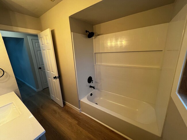 Building Photo - Spacious 4-Bedroom Home with Finished Basement & Garage