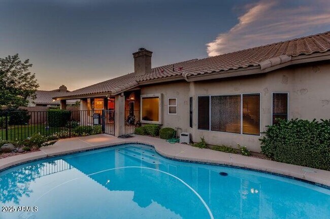Building Photo - 9113 E Palm Tree Dr