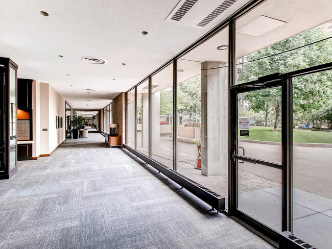 Long indoor lobby with seating areas dispursed for meeting friends, or just walking - 15 S 1st St