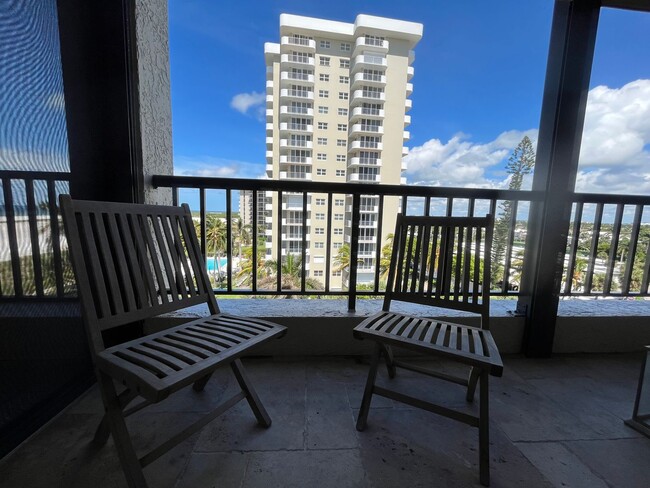 Building Photo - Live the Beach Life in this Upscale 3 Bedr...