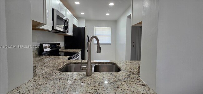 Building Photo - 9000 NW 28th Dr