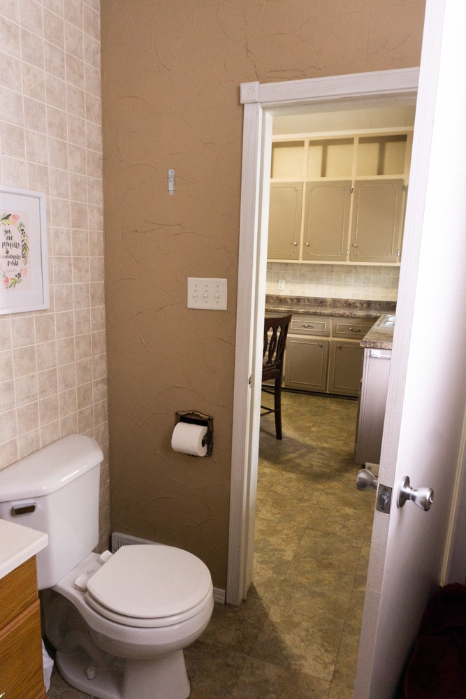 View of bathroom into kitchen, facing west - 622 End Ct