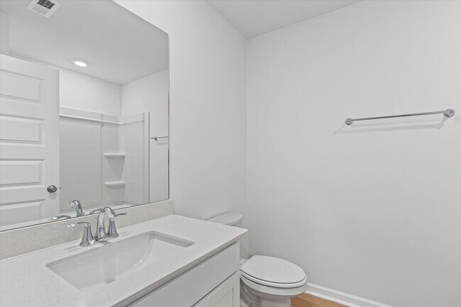 Building Photo - New 3BR Home in Whispering Woods – Modern ...