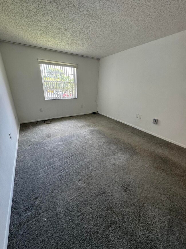 Building Photo - 4990 E Sabal Palm Blvd