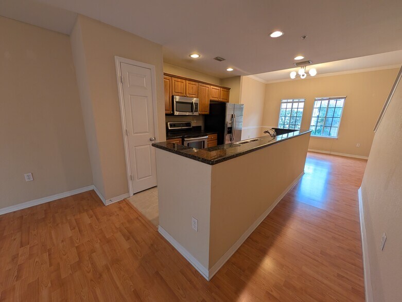 Kitchen with pantry closet - 5218 Hampton Beach Pl