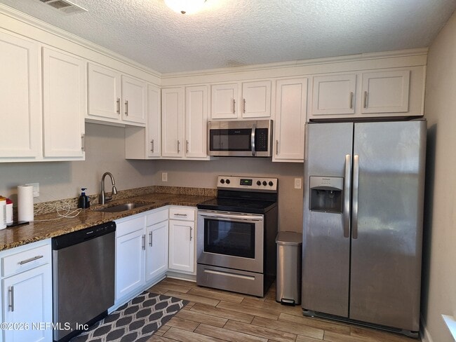 Building Photo - 3459 Excalibur Way E