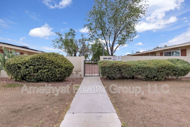 Building Photo - 10547 W Coggins Dr