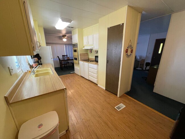 Building Photo - Partially Furnished Manufactured Home on its own Large Corner Lot! *No HOA*