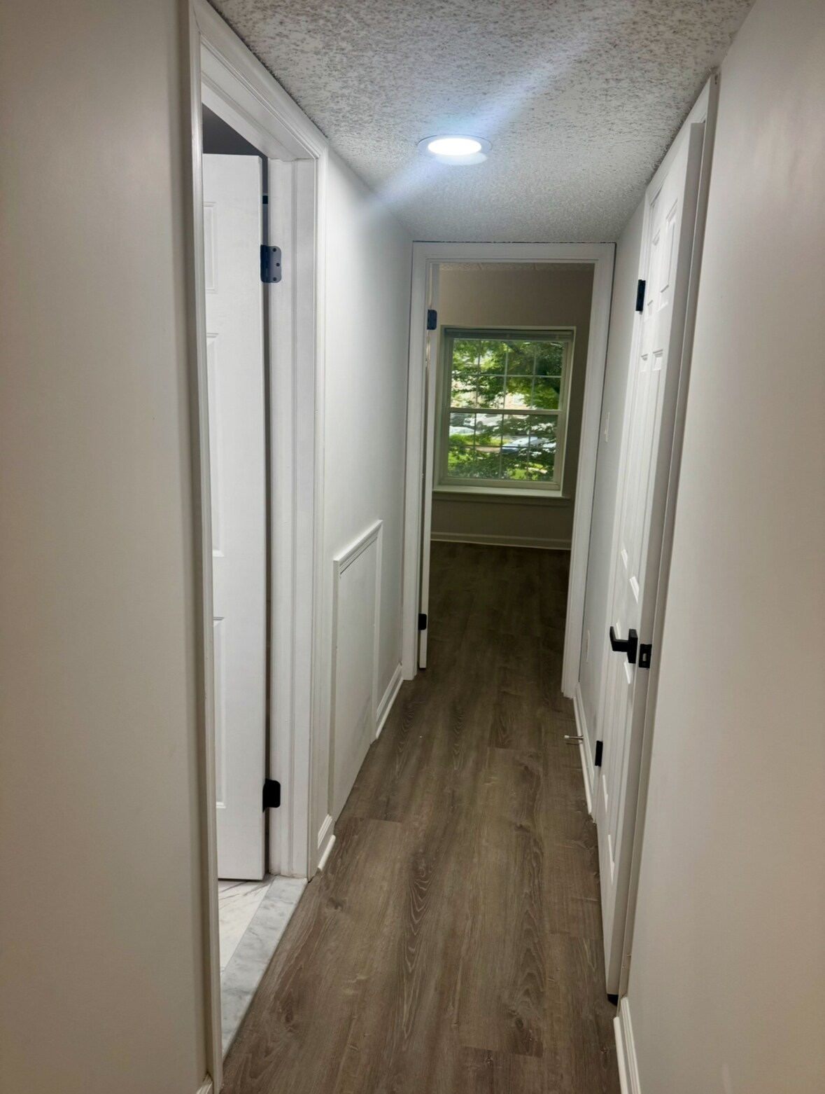 Hallway to Bedroom 2 - 705 Deer Run