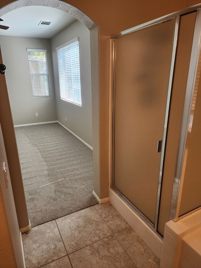 Building Photo - Two Story 3 Bedroom Townhome with 2 Car Garage in Gated Community