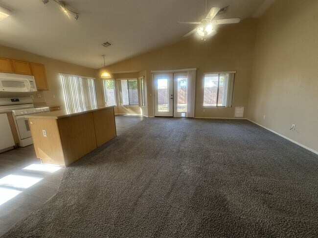 Building Photo - Rare single-level home offers 5 bedrooms and a versatile floor plan designed for comfortable living