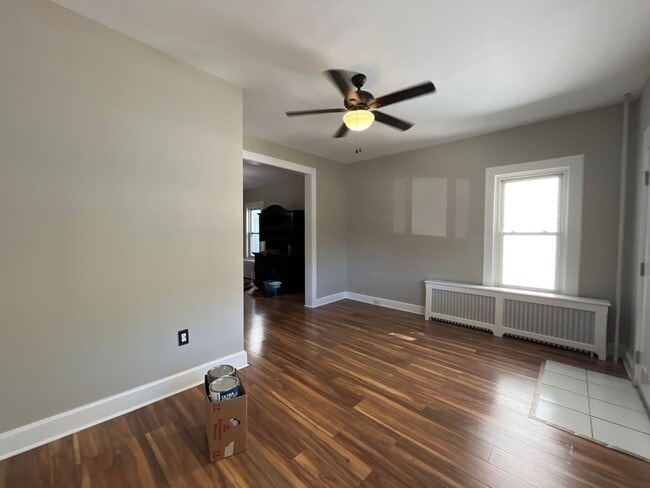 Building Photo - Move-in ready and well-maintained, this 4-...