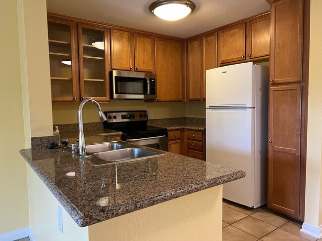 Building Photo - Magnificent 1 Bedroom Condo in Triana in Corona Ranch
