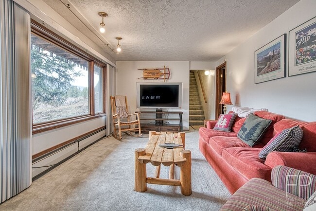 Building Photo - On the Blue River!  HUGE 4 Bedroom home, Furnished Updates throughout!  Bus route!  Spacious parking