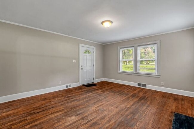 Building Photo - Adorable Home, Just Painted, Wood Flooring...