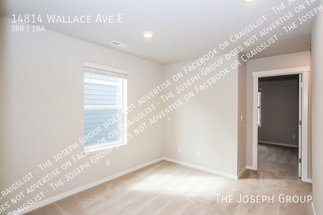 Building Photo - 14814 Wallace Ave E