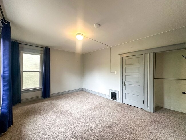 Building Photo - A home where old-world charm meets modern sophistication!