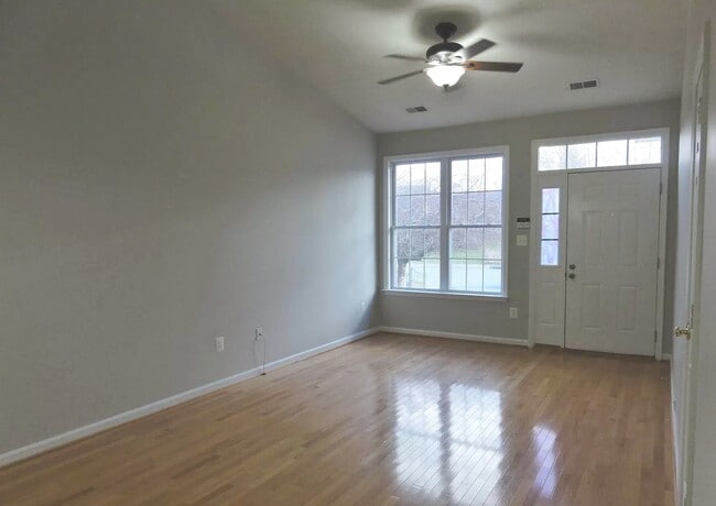 Living room and front windows - 334 Lora Dr