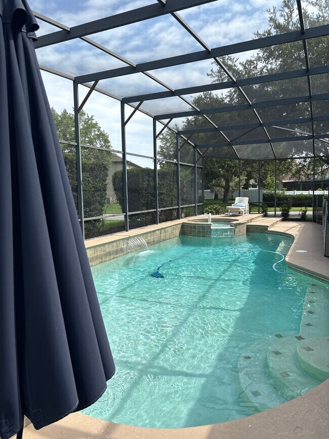 Building Photo - Stunning 6-Bedroom Pool Home in Desirable ...