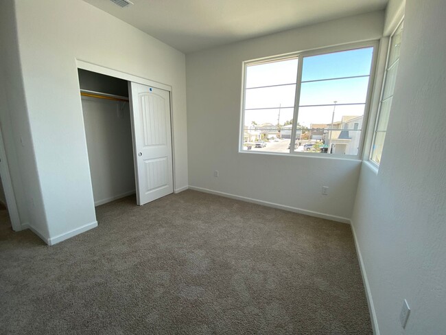 Building Photo - Be the First to Live in This Stunning New ...