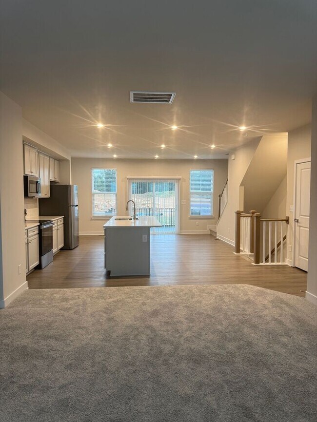 Building Photo - Brand New 3-Story Townhome with 2-Car Gara...
