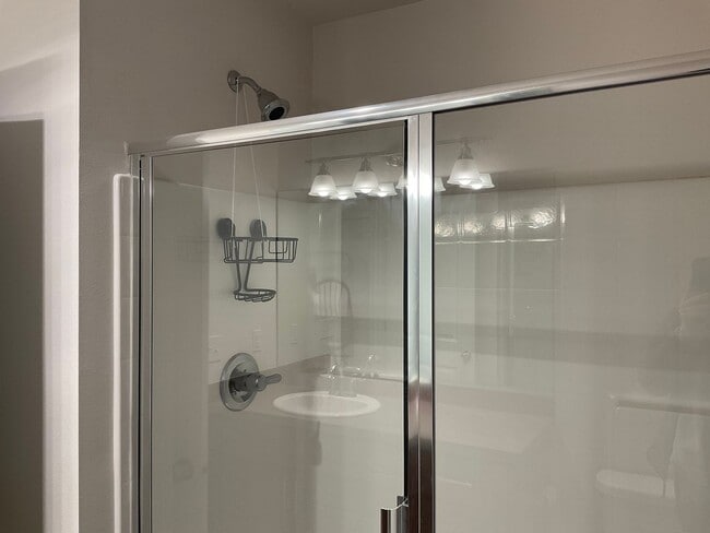 Building Photo - Riverfront Townhome with Tandem Garage & Fenced Yard