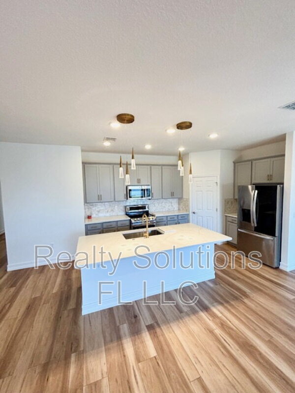 Building Photo - 1616 Blue Lagoon Cir