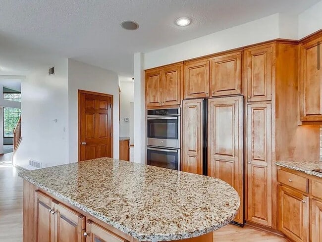 Building Photo - Stunning 4BR/5BA Eden Prairie Home W/Conservation Area Views Available 4/15!