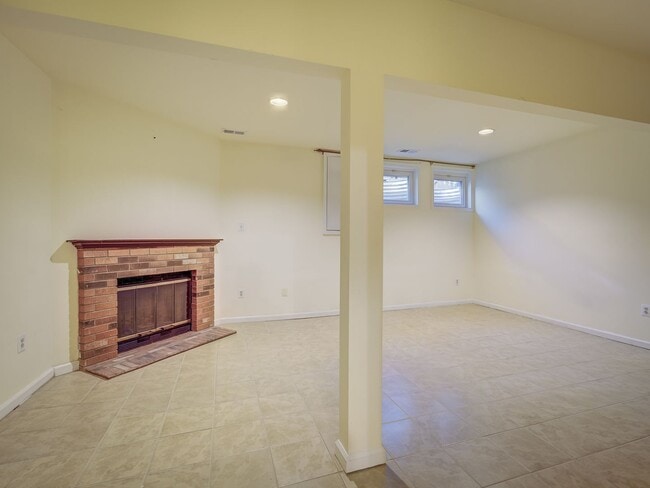 Building Photo - A Lovely Brick-Front Town House