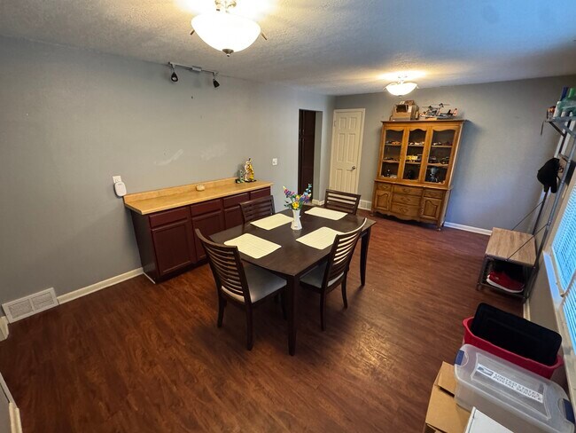 Dining room. Hutch available to use while renting - 1542 3rd Ave