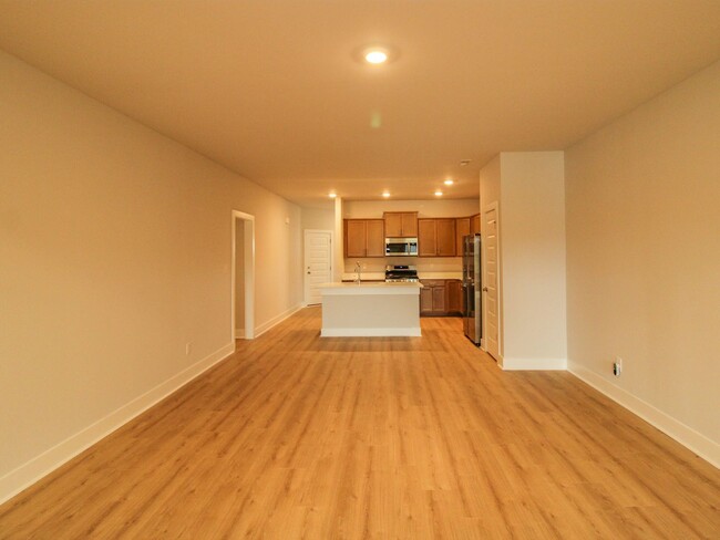 Building Photo - NEW Townhome corner unit in excellent loca...