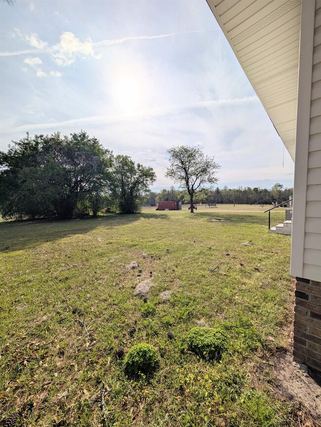 Building Photo - 6003 Sunrise Dr