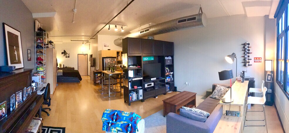 Full space from warehouse windows facing into the unit -- alternative furnishing/layout - 1400 NW Irving St