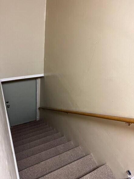entrance stairs. - 207 N 1st St