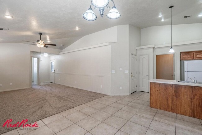 Building Photo - Fresh Carpet! Spacious 5-Bedroom Townhome