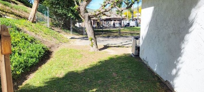 Building Photo - Charming 2BR Retreat with Private Patio, Scenic Views & Resort-Style Amenities