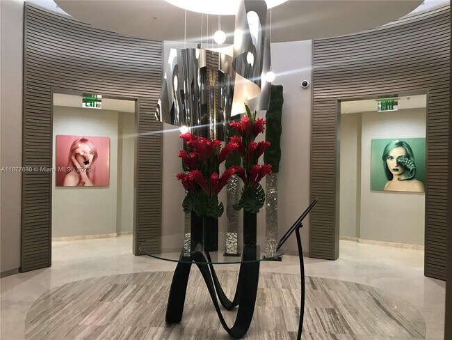 Building Photo - 10275 Collins Ave