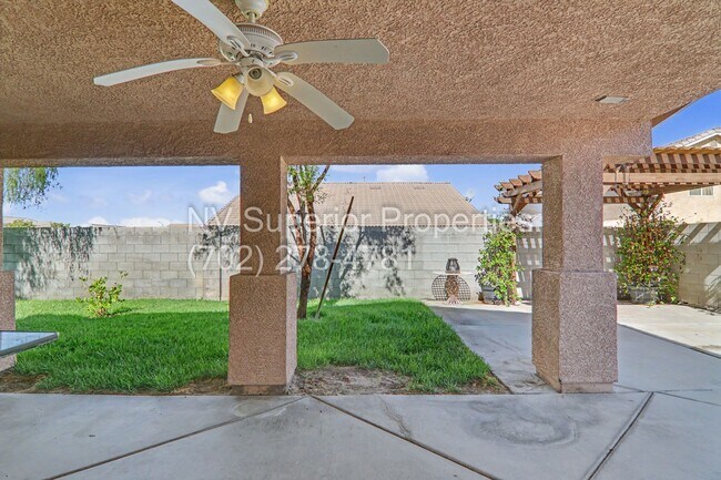 Building Photo - NW!! 4 bedrooms!! Bed & Bath DownStairs!!! RV Parking!!! Synthetic Grass Front yard!! Real Grass ...