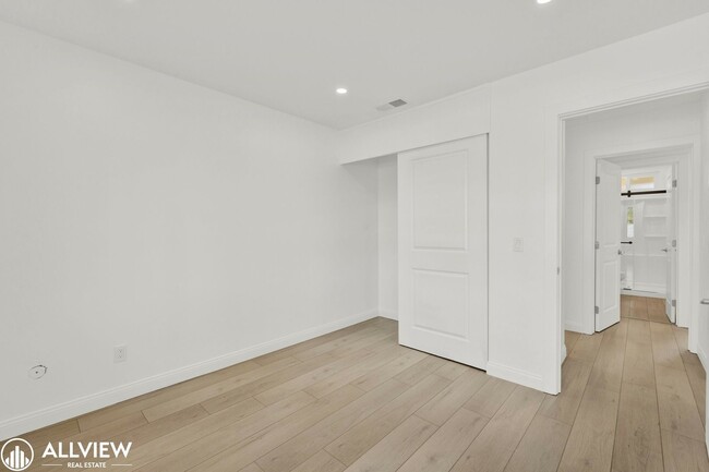 Building Photo - Fully Renovated 4-Bedroom Home with Firepl...