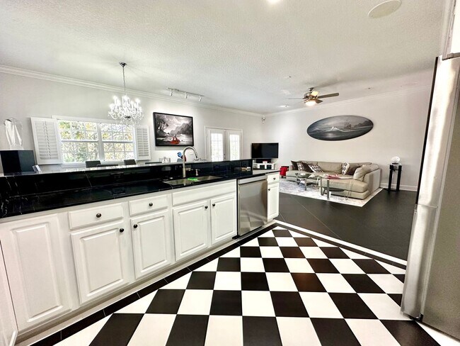 Building Photo - Bright, breezy & convenient: Your wew St. ...